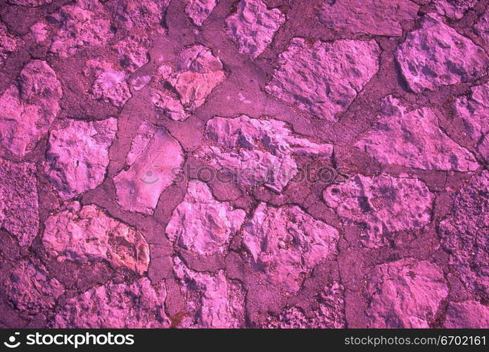 Close-up of a painted stone wall