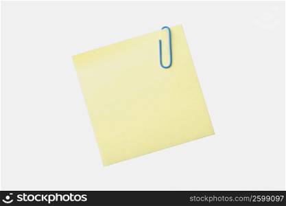 Close-up of a paper clip on a sheet of paper