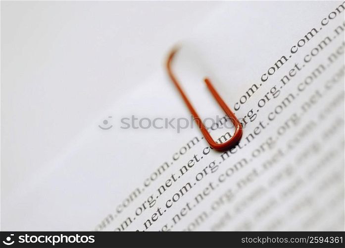 Close-up of a paper clip on documents