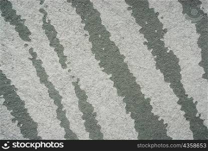Close-up of a pattern on a rough surface