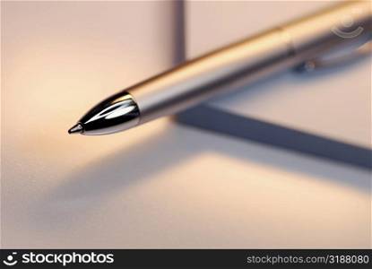 Close-up of a pen on a notebook