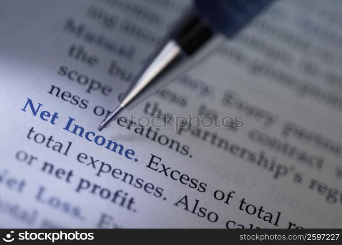 Close-up of a pen on a sheet of paper