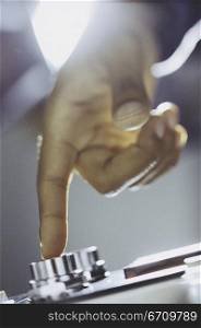 Close-up of a person&acute;s finger pressing a button