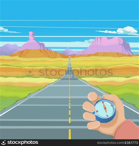 Close-up of a person&acute;s hand holding a compass over a two lane highway