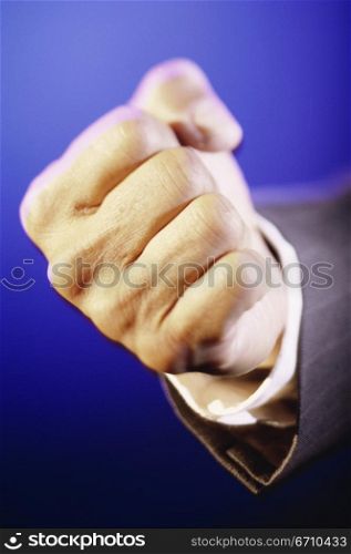 Close-up of a person&acute;s hand making a fist