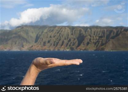 Close-up of a person&acute;s hand, Na Pali Coast State Park, Kauai, Hawaii Islands, USA