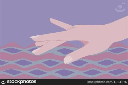 Close-up of a person&acute;s hand touching water