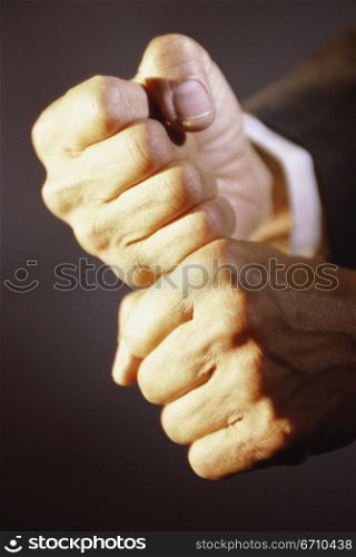 Close-up of a person&acute;s hands making a fist