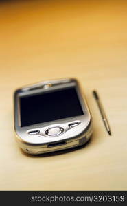 Close-up of a personal data assistant with a stylus