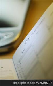 Close-up of a personal organizer with a personal data assistant