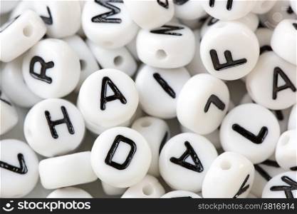 Close up of a pile of letter beads . Shallow depth of field