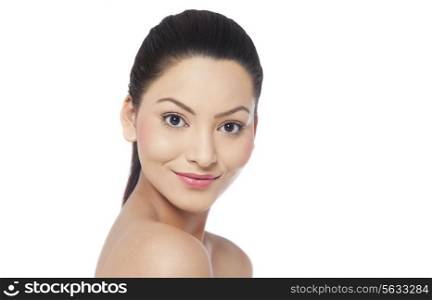 Close-up of a pretty young woman over white background