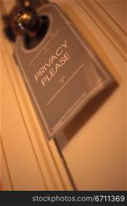 Close up of a privacy sign on a door
