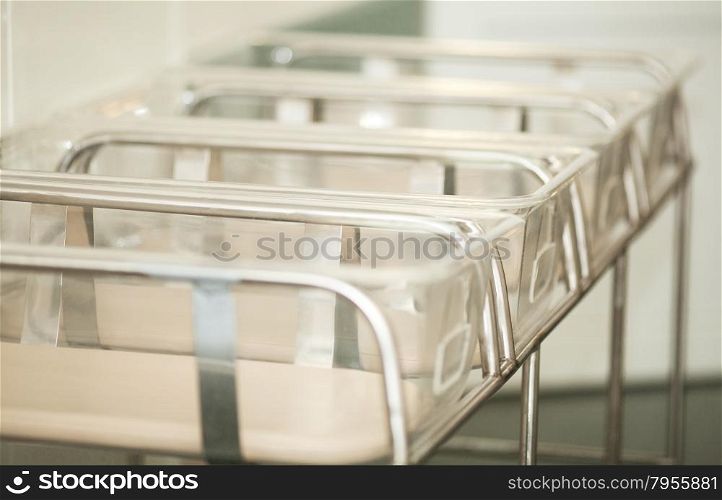 Close up of a range of empty baby containers in the maternity hospital