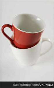 Close-up of a red tea cup in a white tea cup