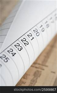Close-up of a rolled up paper with numbers