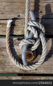 Close-up of a rope tied to a cleat