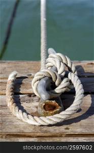 Close-up of a rope tied to a cleat