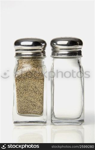 Close-up of a salt and a pepper shaker
