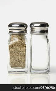 Close-up of a salt and a pepper shaker