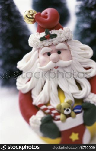 Close-up of a Santa Claus Christmas ornament