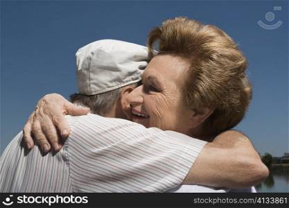 Close-up of a senior couple embracing each other