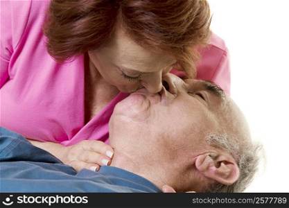 Close-up of a senior couple kissing