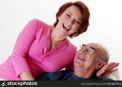 Close-up of a senior couple laughing