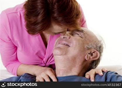 Close-up of a senior couple nuzzling