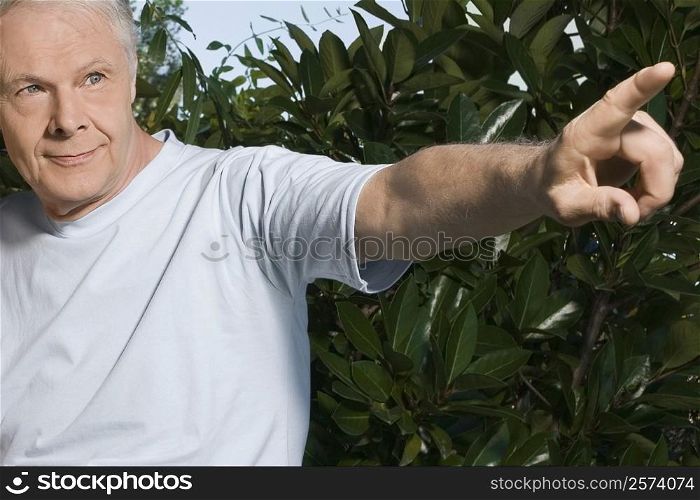 Close-up of a senior man pointing