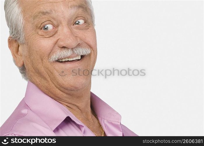 Close-up of a senior man smiling