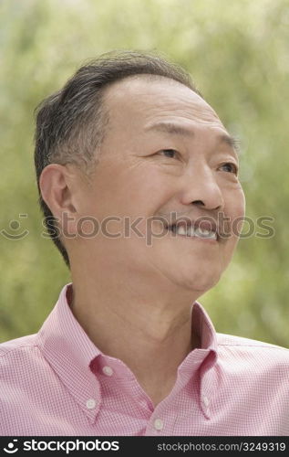 Close-up of a senior man smiling