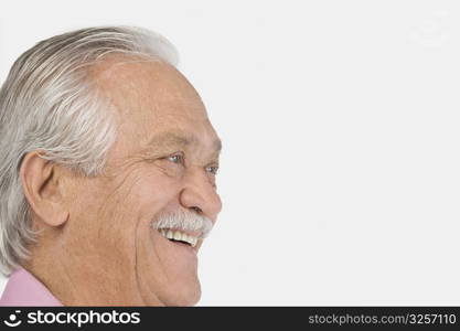 Close-up of a senior man smiling