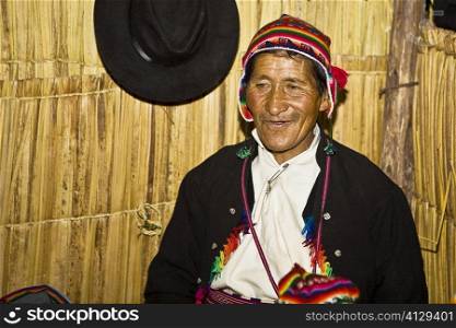 Close-up of a senior man smiling, Taquile Island, Lake Titicaca, Puno, Peru