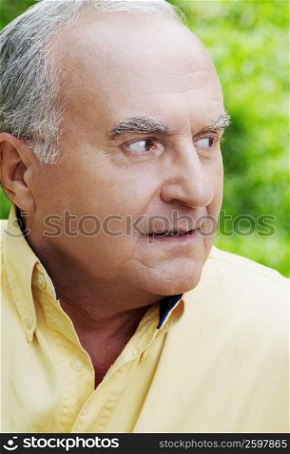 Close-up of a senior man thinking
