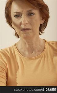 Close-up of a senior woman looking worried