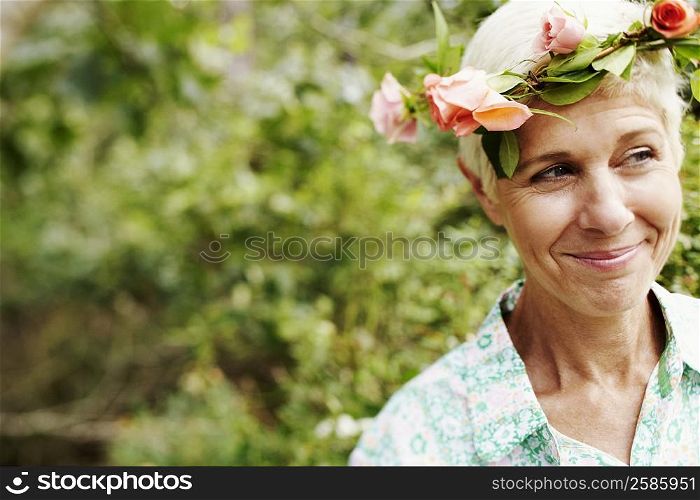Close-up of a senior woman smiling and looking away
