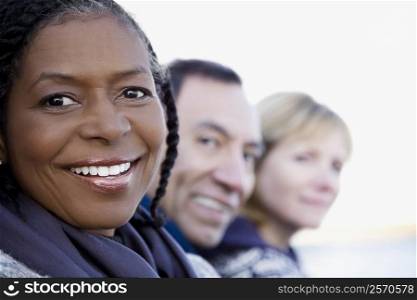 Close-up of a senior woman smiling with her friends