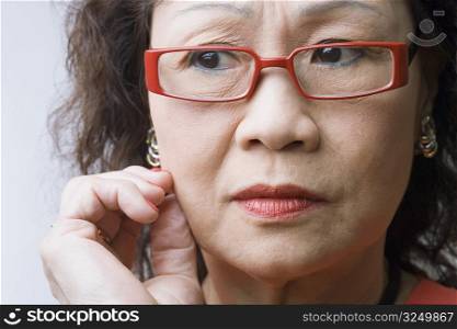 Close-up of a senior woman thinking