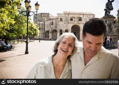 Close-up of a senior woman with her son smiling, Santo Domingo, Dominican Republic