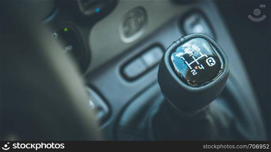 Close up of a shift lever, sports car