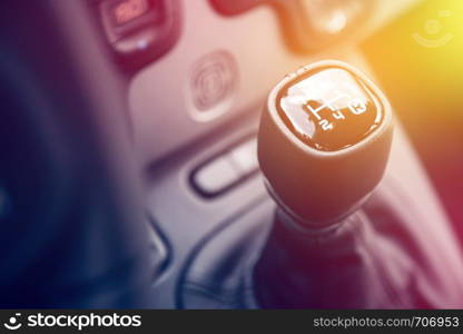 Close up of a shift lever, sports car