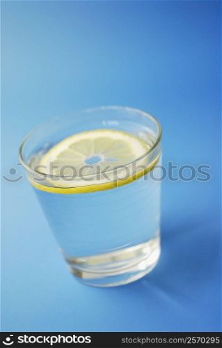 Close-up of a slice of lemon in a glass
