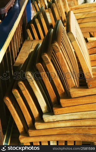 Close-up of a stack of chairs in a store