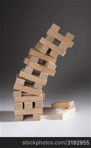 Close-up of a stack of falling wooden blocks