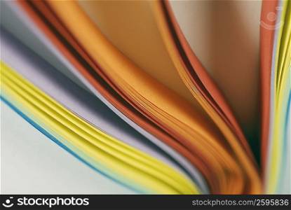 Close-up of a stack of multi-colored paper