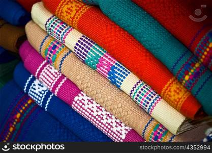 Close-up of a stack of multi-colored shawls, Santo Tomas Jalieza, Oaxaca State, Mexico