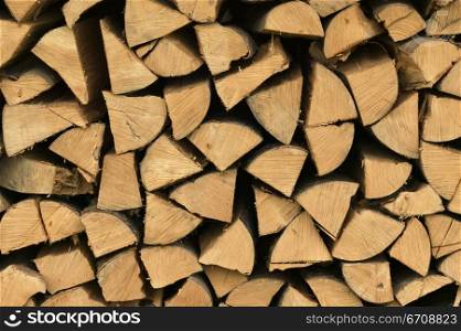 Close-up of a stack of wooden logs