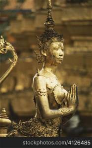 Close-up of a statue in a temple, Grand Palace, Bangkok, Thailand