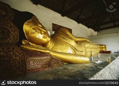 Close-up of a statue of reclining Buddha in a temple, Chiang Mai, Bangkok, Thailand